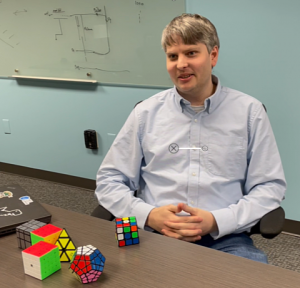 Jamie Eldredge and his collection of rubix cubes